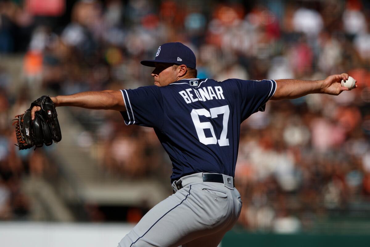 Robert Suarez of the San Diego Padres pitches in the eighth inning News  Photo - Getty Images