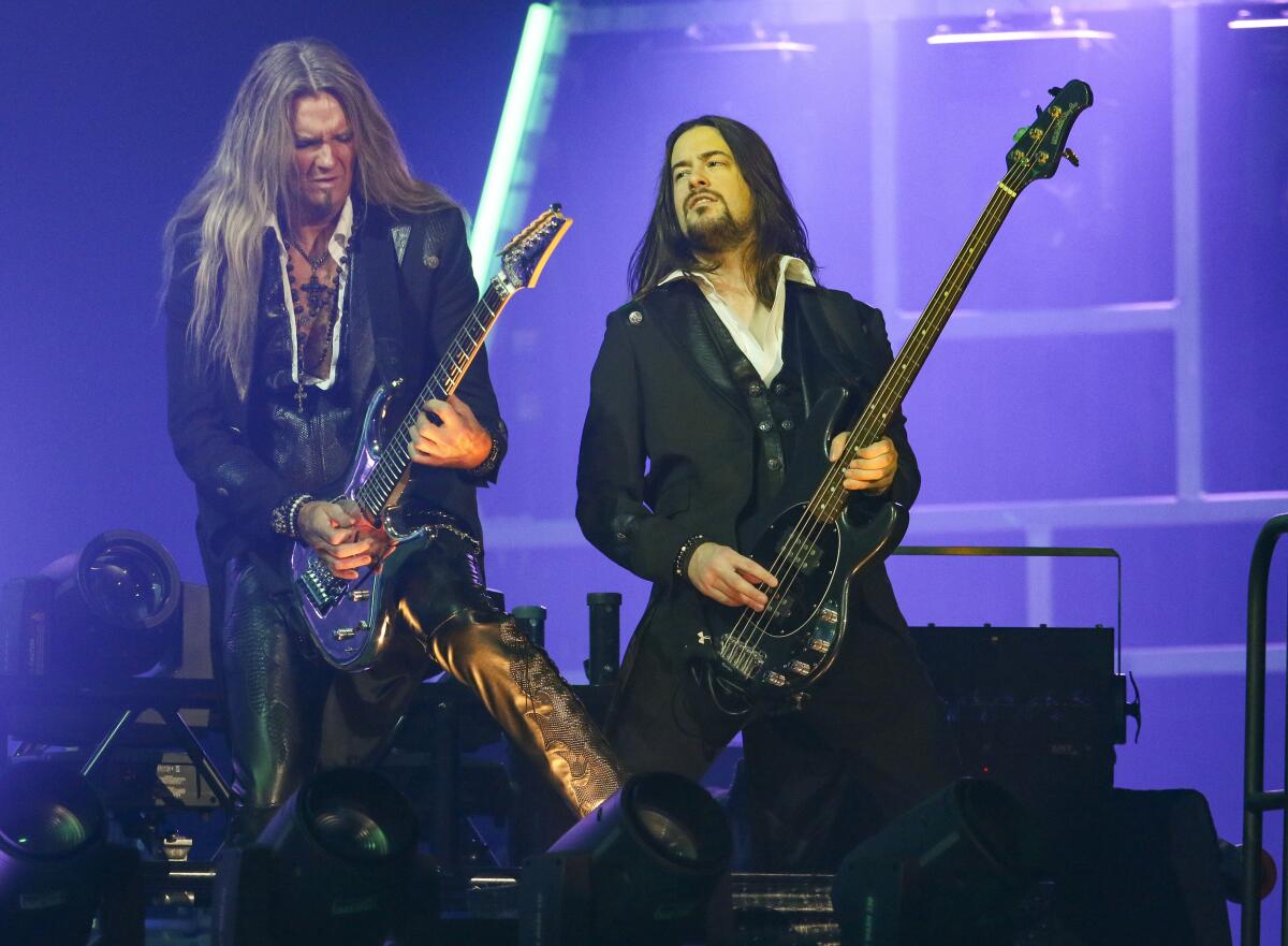 Trans-Siberian Orchestra guitarists Angus Clark, left, and Tony Dickinson.