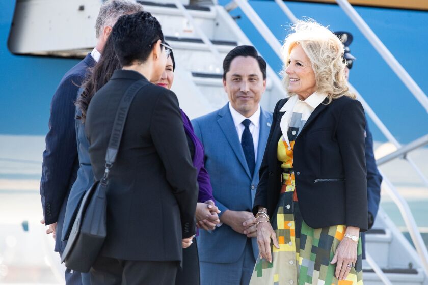 San Diego, CA - February 03: First Lady Dr. Jill Biden is greeted by mayor Todd Gloria, Chair of the San Diego County Board of Supervisors Nora Vargas, Rep. Sara Jacobs, Rep. Scott Peters, and Chairwoman of the James Indian Village of California Erica Pinto at Signature Flight Support airport on Friday, Feb. 3, 2023 in San Diego, CA. (Meg McLaughlin / The San Diego Union-Tribune)