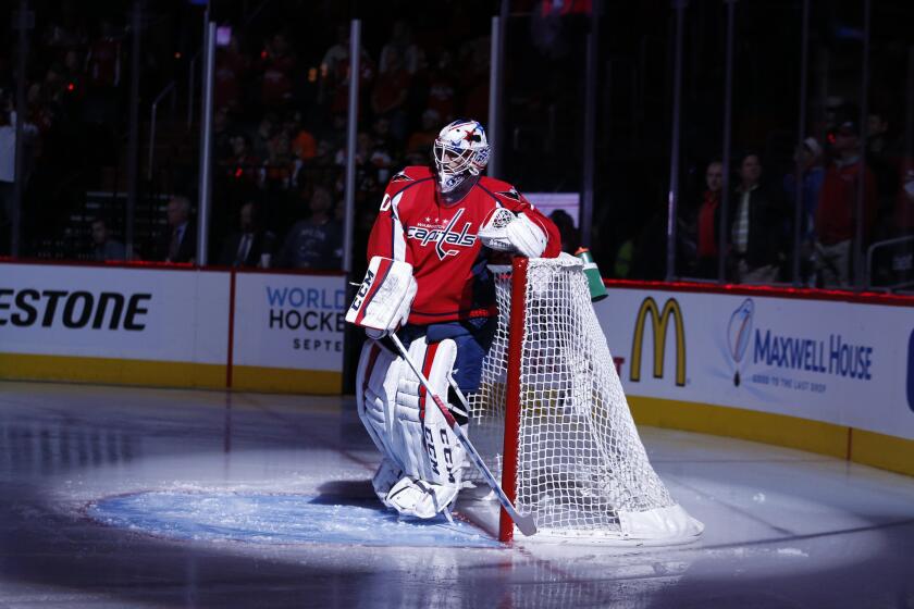 Goalie Braden Holtby (70) takes a moment before Game 1 of the Capitals first round matchup with the Philadelphia Flyers.