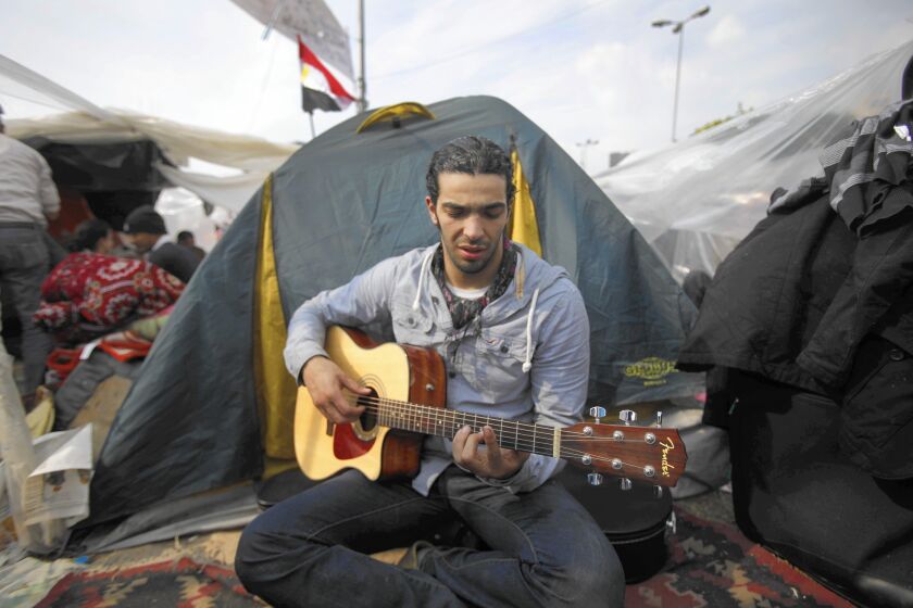 Ramy Essam in Cairo in 2011. He continues to write songs about the upheaval in Egypt.