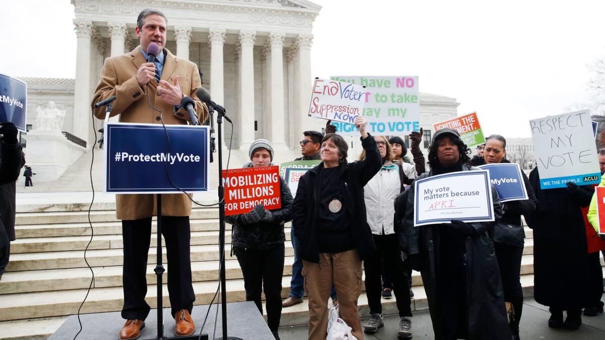 Rep. Tim Ryan (D-Ohio) speaks at a rally outside the Supreme Court on Wednesday, protesting Ohio's purges of voter rolls.
