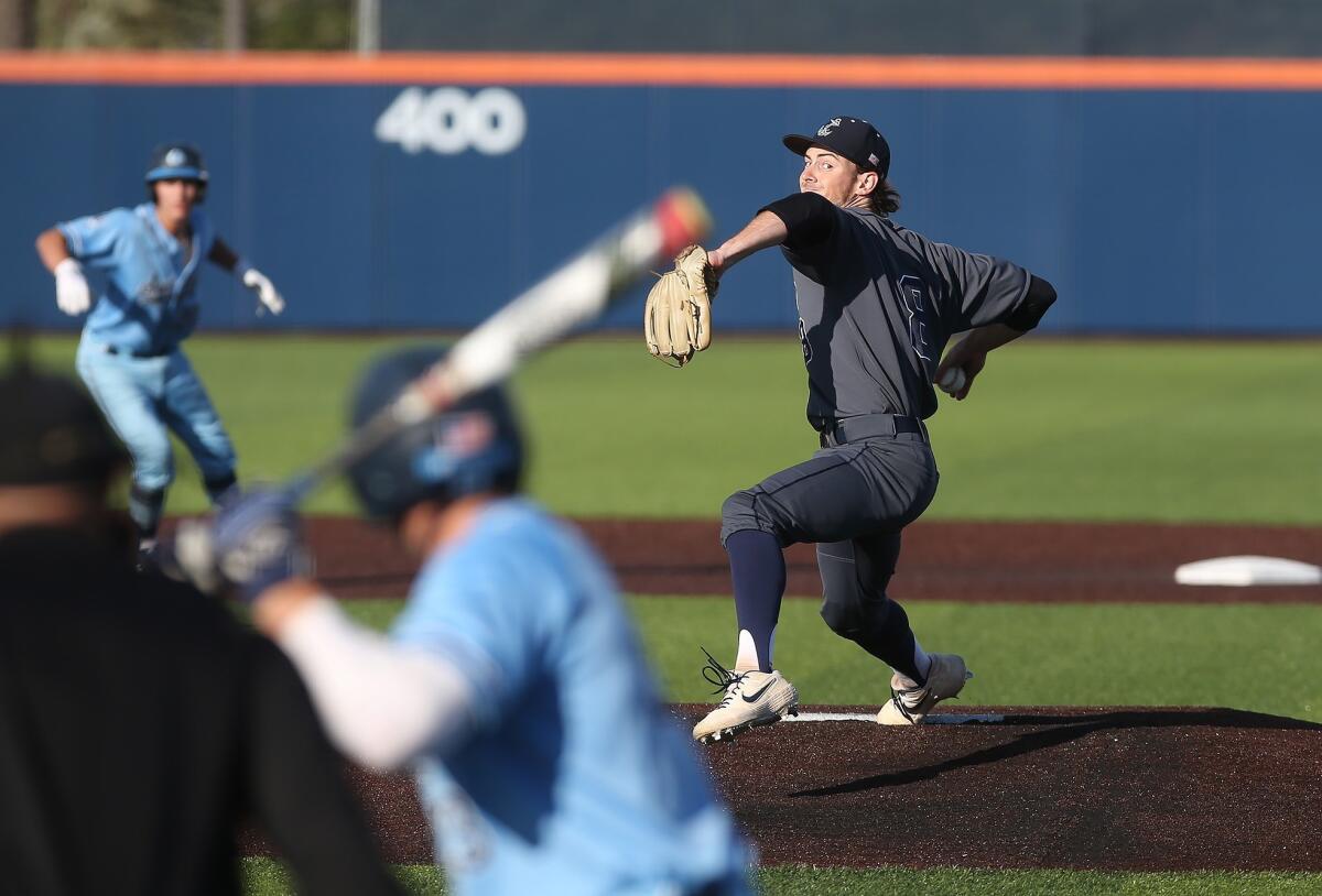 Newport Harbor High pitcher Cameron Mahaffy throws a strike late in the Battle of the Bay game against Corona del Mar at Orange Coast College on Wednesday.