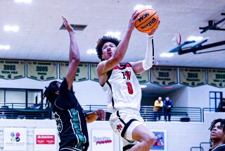 Trent Perry of Harvard-Westlake goes airborne during game at The Classic at Damien.