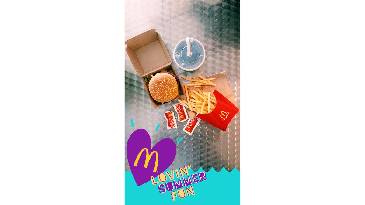 Snapchat increasingly has used its chat and video app to run ads, such as this digital sticker from McDonald's.