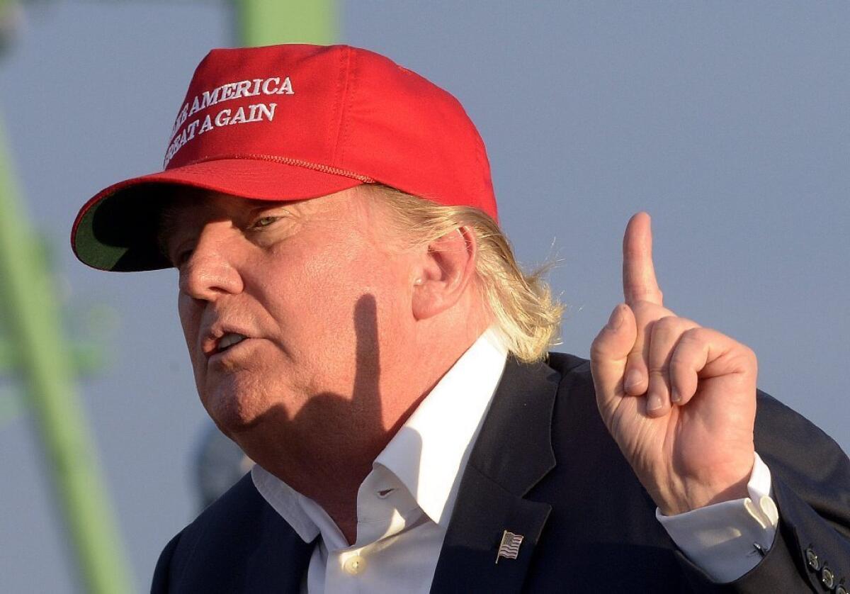 Republican presidential frontrunner Donald Trump campaigns aboard the battleship Iowa in Los Angeles Harbor.