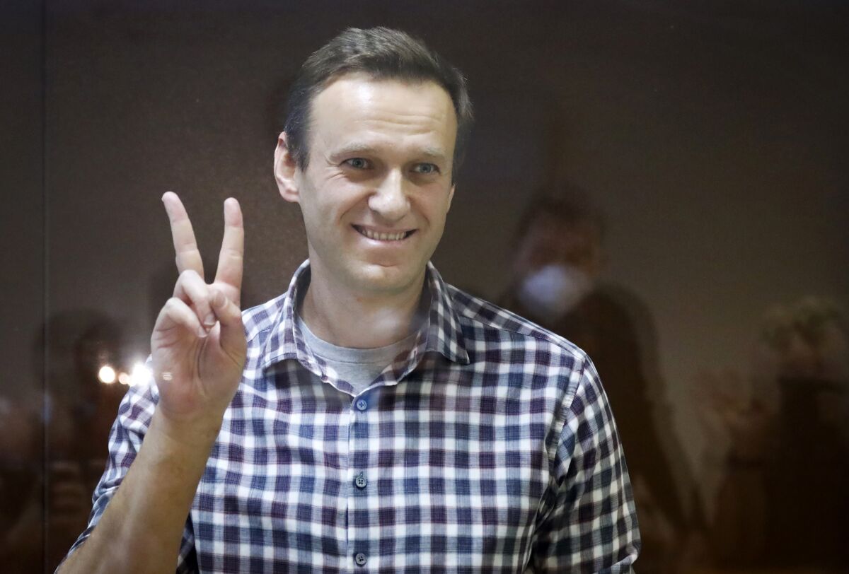 Russian opposition leader Alexei Navalny flashing victory sign