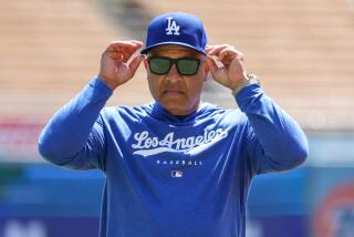Los Angeles, CA, Sunday, July 7, 2024 - Dodgers manager Dave Roberts on the field.