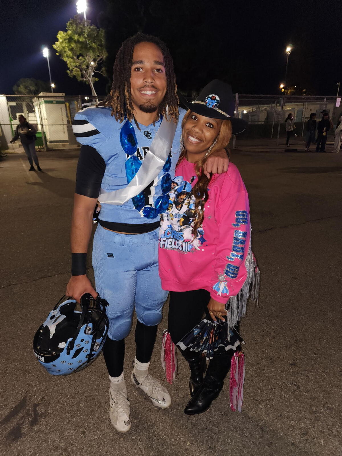 Carson quarterback Chris Fields and his mother, Shere Fletcher.