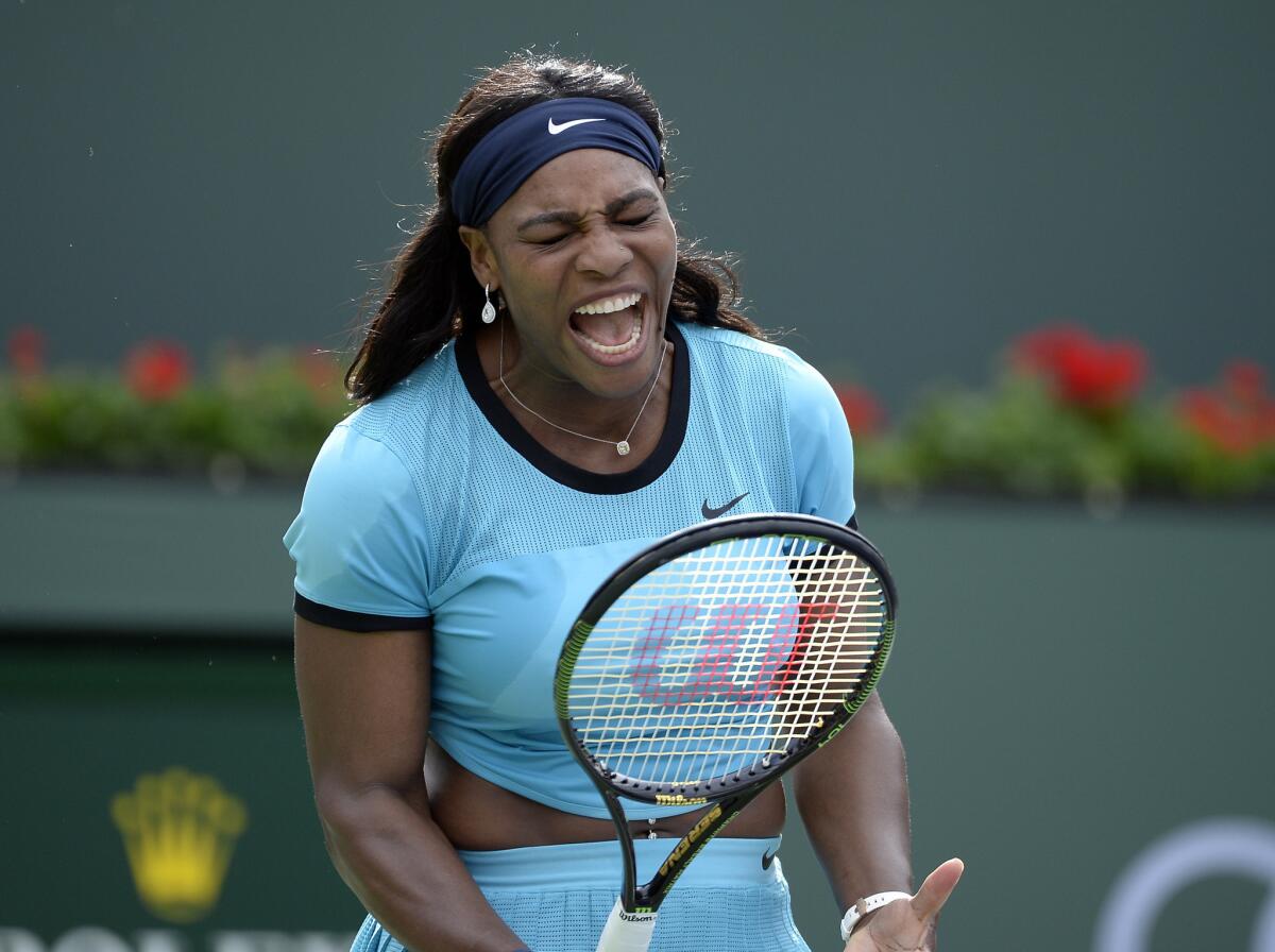 Serena Williams reacts after a point during her third round match against Yulia Putintseva at the BNP Paribas Open at Indian Wells.
