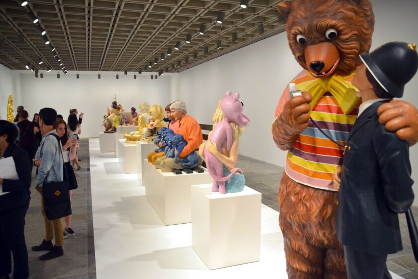 Sculptures by artist Jeff Koons on display in the exhibition "Jeff Koons: A Retrospective" at the Whitney Museum of American Art in New York.