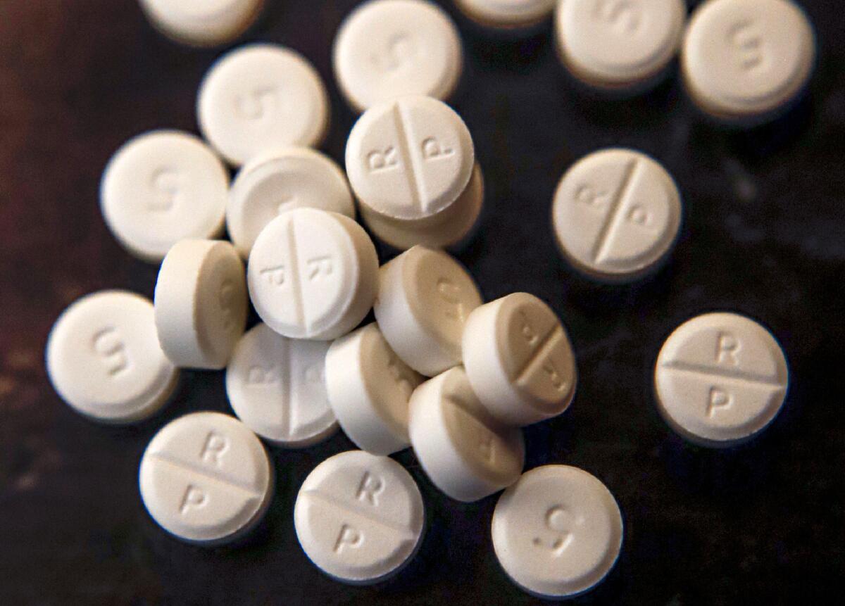 Photo shows 5-milligram pills of Oxycodone.