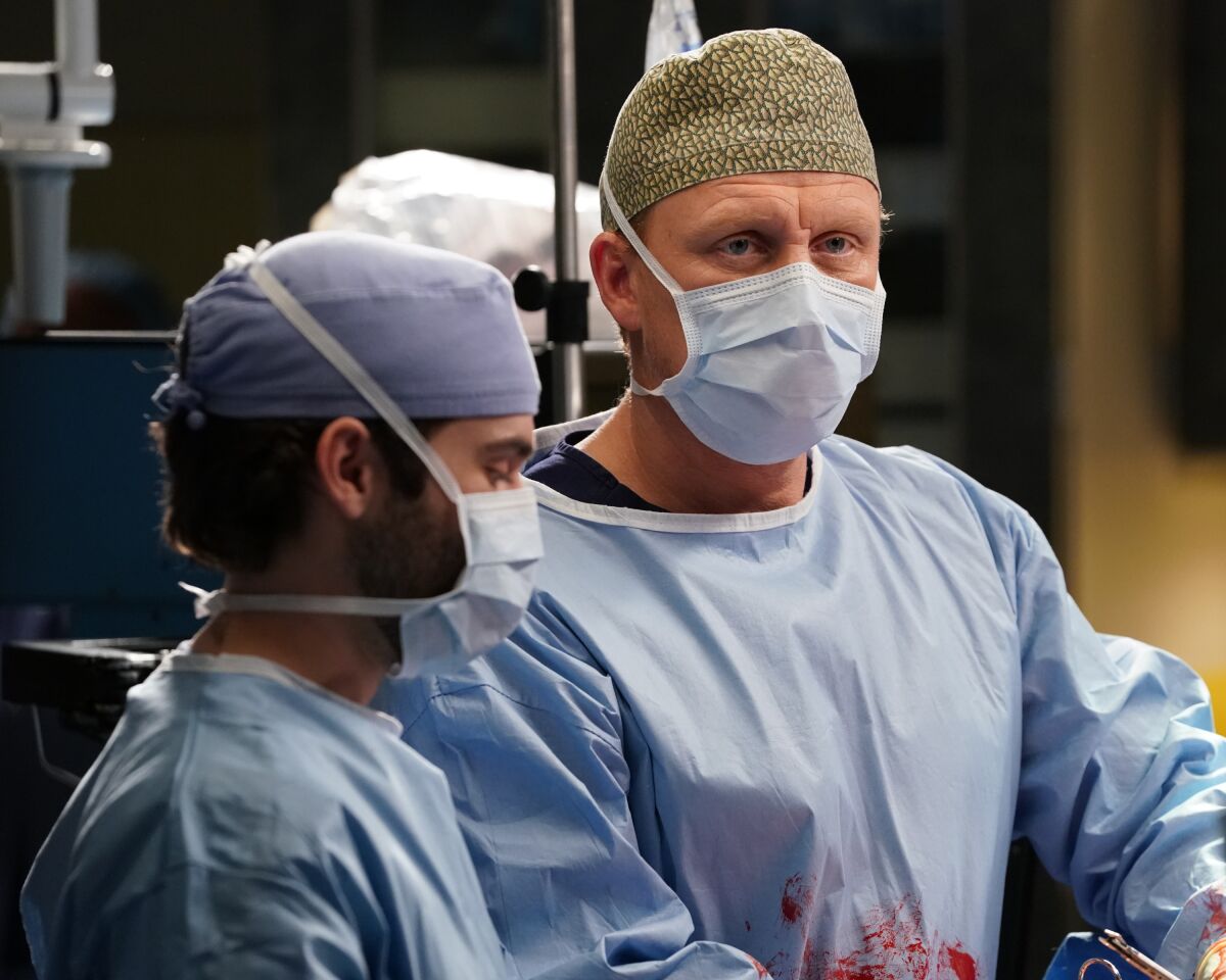 "Grey's Anatomy" star Kevin McKidd, right, as Dr. Owen Hunt.