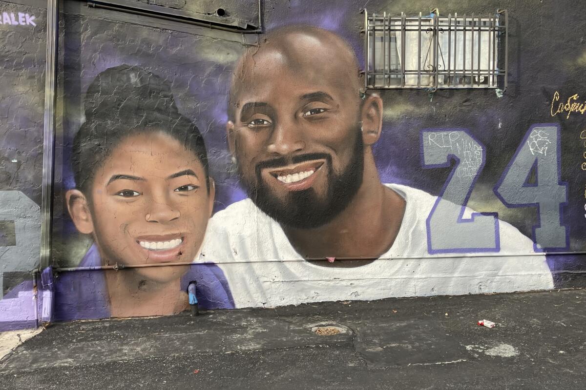 A mural honors Kobe and Gianna Bryant at the Center Fold Newsstand on Melrose Avenue in Fairfax.