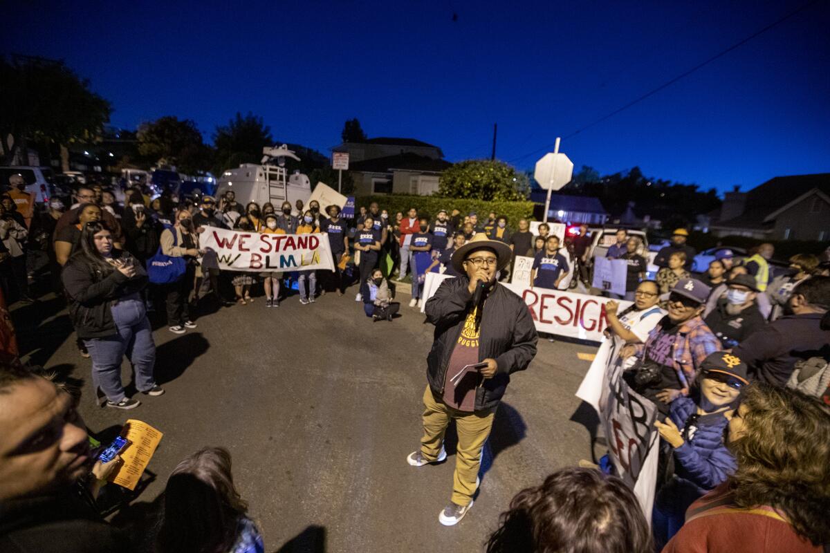 Hundreds gather in the street near L.A. City Councilmember Kevin de Leon's home in Eagle Rock to demand his resignation.