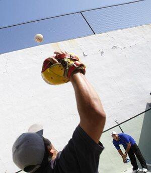 A group of Mixteca Indians demonstrates a different form of handball at an event to raise money to buy the Maravilla Handball Court in East Los Angeles.