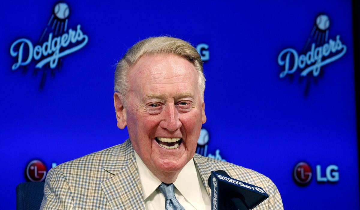 Dodgers Hall of Fame broadcaster Vin Scully announces he will return to broadcast his 67th, and last, baseball season in 2016