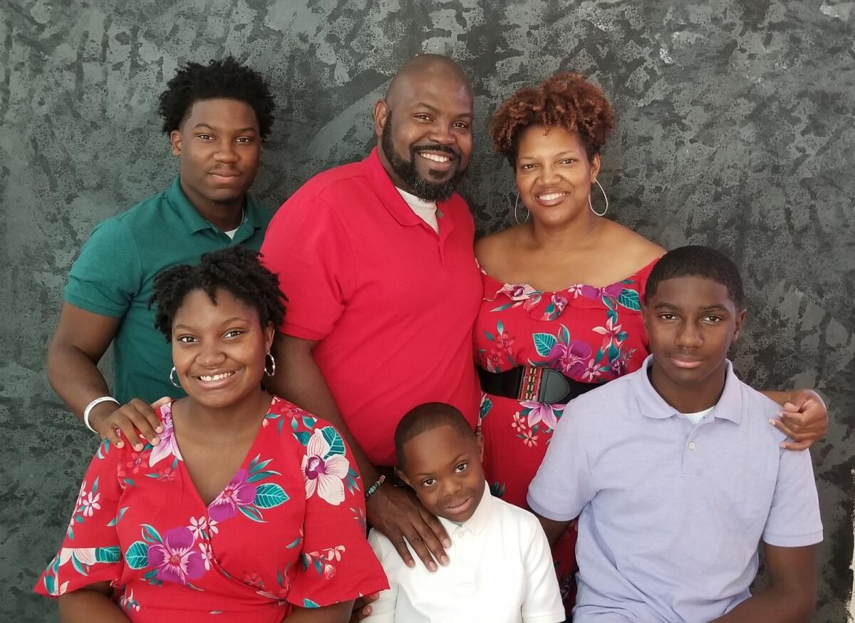 Chris Williams with wife Demetris and children Chris Jr., 18, left; Zekariah, 16; Manny, 10; and Ezekiel, 14.