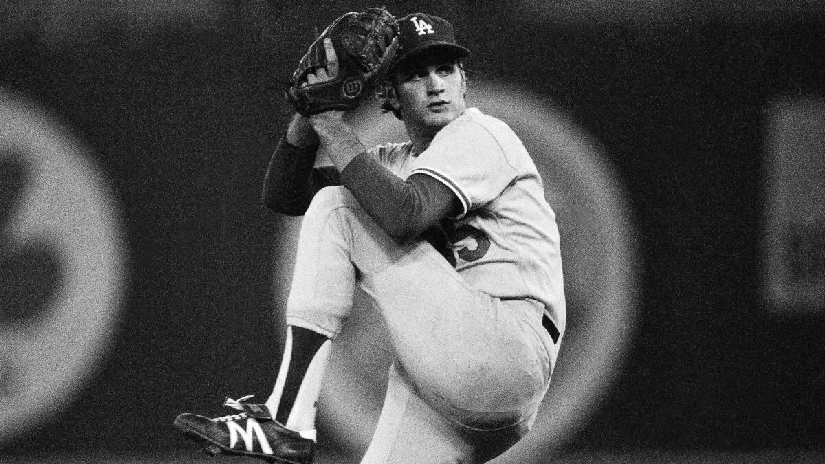 Dodgers pitcher Bob Welch throws against the Philadelphia Phillies during a game in October 1978. The two-time Cy Young award winner has died at the age of 57.