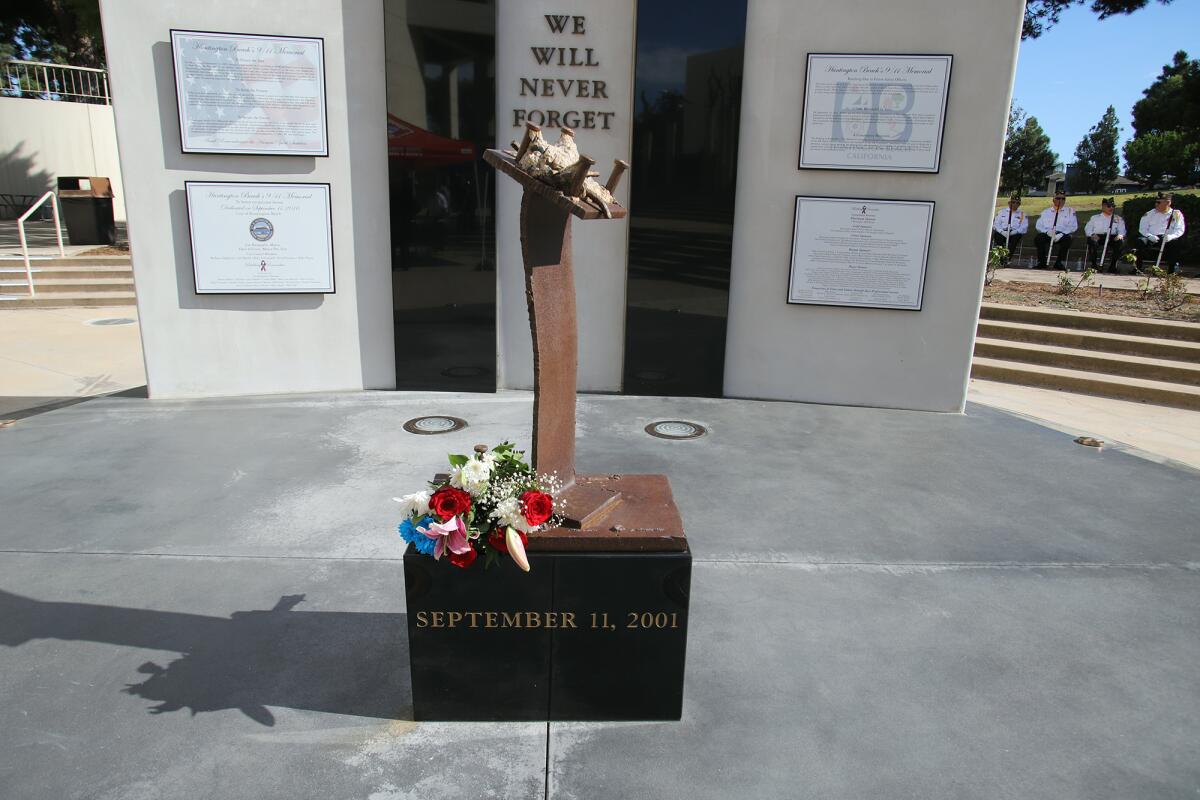 Flowers were placed Sunday at Huntington Beach's Sept. 11 memorial during A Day to Remember 9/11 Patriot Day Ceremony.