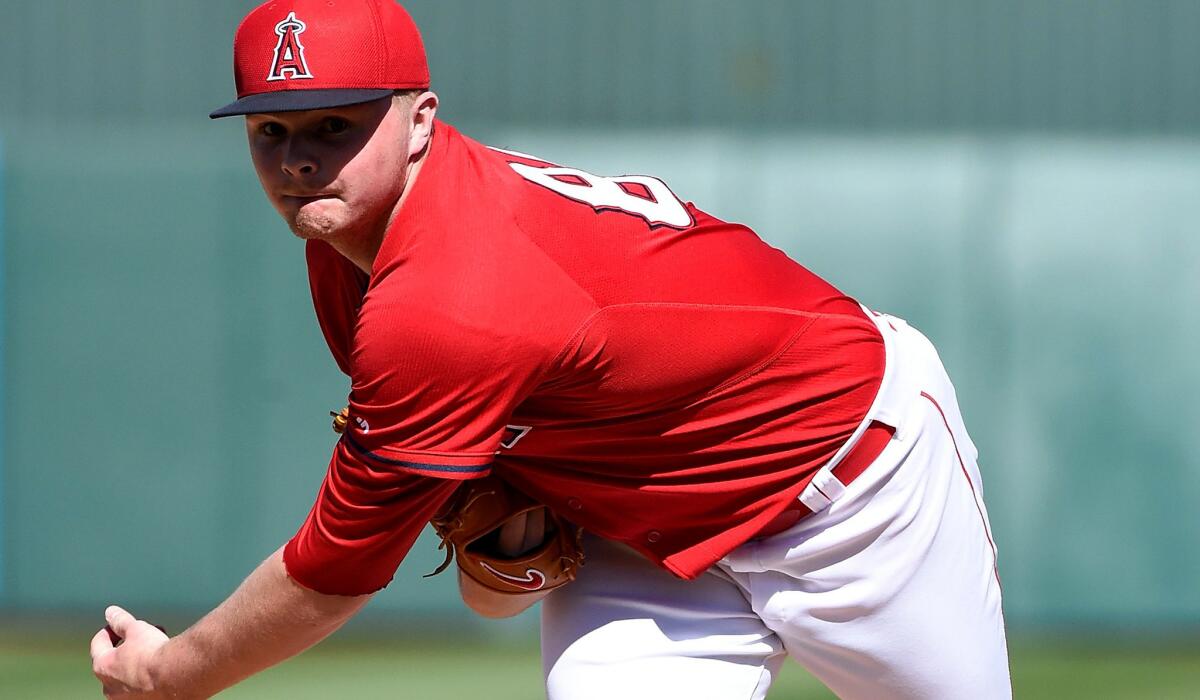 Angels pitcher Sean Newcomb works against the Kansas City Royals during a spring training game on March 8 at Tempe Diablo Stadium.