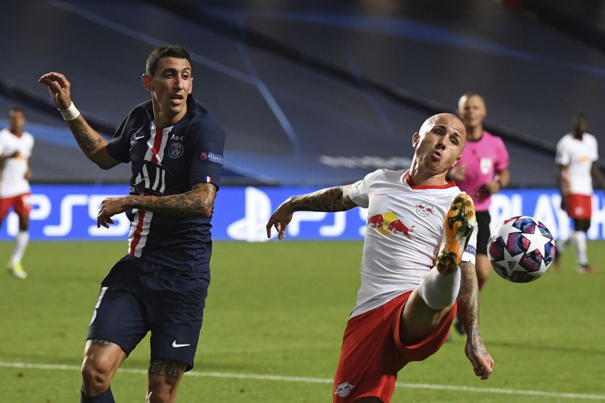 PSG's Angel Di Maria, left, challenges for the ball with Leipzig's Angelino during the Champions League semifinal soccer match between RB Leipzig and Paris Saint-Germain at the Luz stadium in Lisbon, Portugal, Tuesday, Aug. 18, 2020. (David Ramos/Pool Photo via AP)