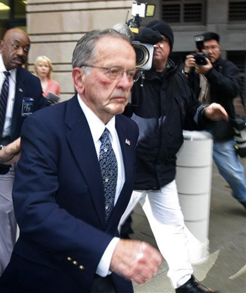 In this Oct. 27, 2008 file photo, then Sen. Ted Stevens, R-Alaska, leaves federal court in Washington after a guilty verdict was returned by the jury in his trial. (AP Photo/Gerald Herbert, File)