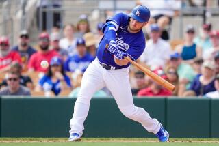 GLENDALE, ARIZONA - MARCH 10: Max Muncy #13 of the Los Angeles Dodgers grounds out in the third inning.