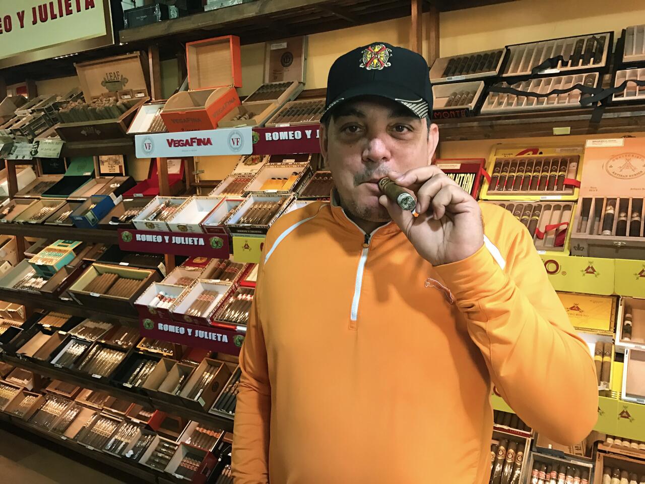 Miguel Cuenca, 53, owner of the Hollywood store Cuenca Cigars, Inc. didn't see any reasons to celebrate. "I would be happy if they had hung him on a tree or had judged him," he said while smoking an Arturo Fuente Don Carlos cigar. "But he died happy in the comfort of his family. He has never paid for his crimes." He left Cuba in 2001, and vowed never to return until things change in his home country. After hearing the news Friday night, he stayed up discussing the future of Cuba with about 15 other people until 3 a.m. "I would be happy if he had been judged," he said.