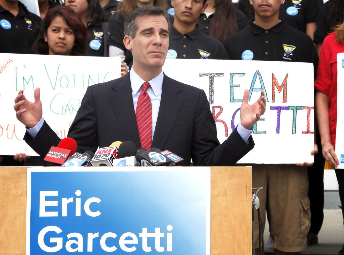 Mayoral candidate Eric Garcetti speaks at a news conference after he reached the May 21 mayoral runoff against City Controller Wendy Greuel.