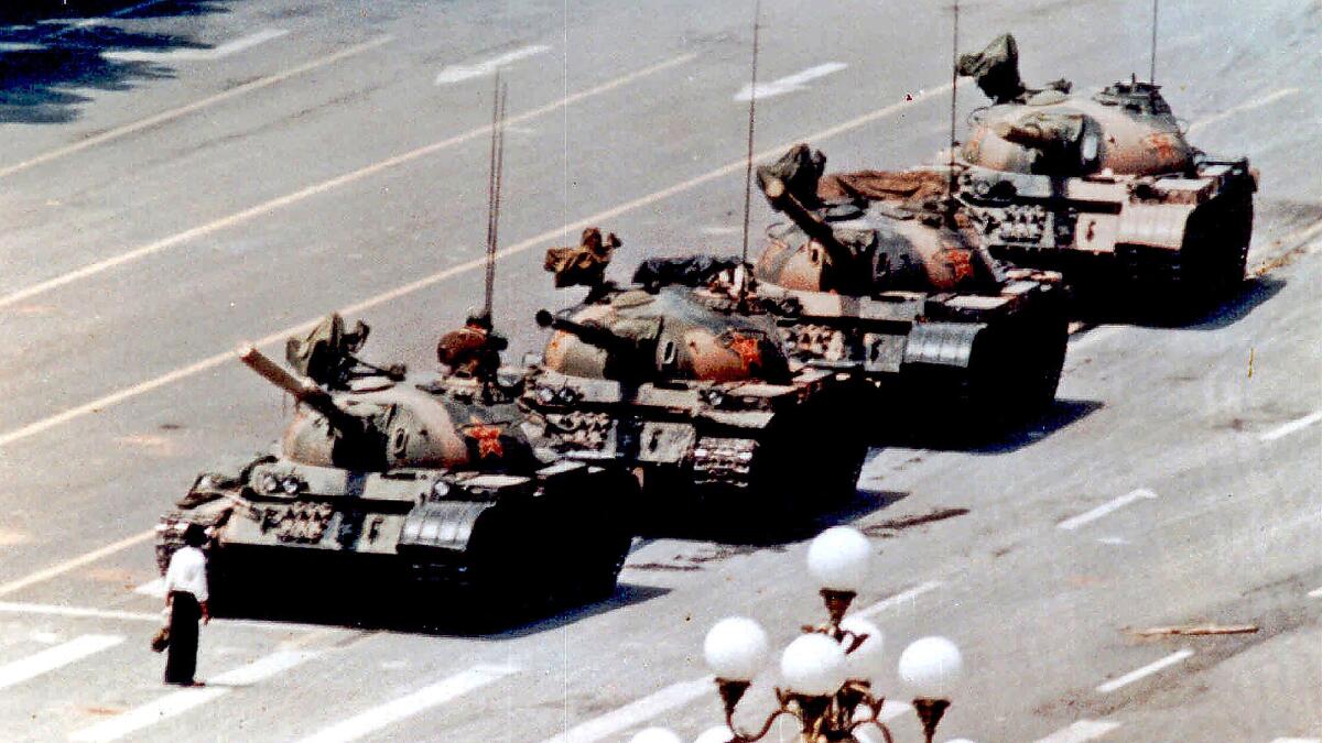 A demonstrator stands in front of a line of tanks in Beijing on June 5, 1989.