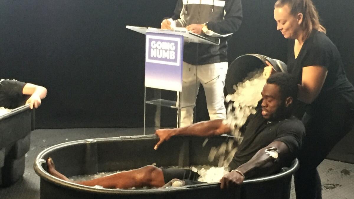 Rams receiver Brandin Cooks receives icy treatment during the taping of "Going Numb."