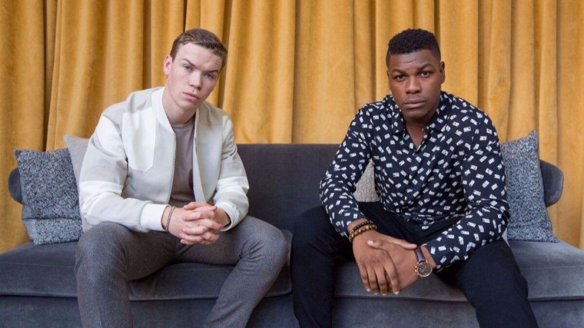 "Detroit" stars Will Poulter, left, and John Boyega, right, are photographed at the Foundation Hotel in Detroit, Michigan.