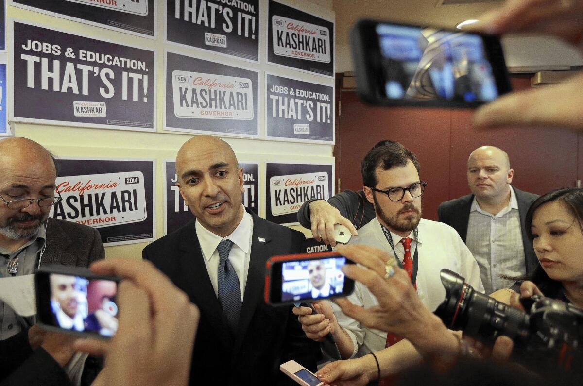 Republican gubernatorial candidate Neel Kashkari speaks with reporters in March; polls showing Gov. Jerry Brown about 20 points ahead of Kashkari could fuel public apathy at election time.