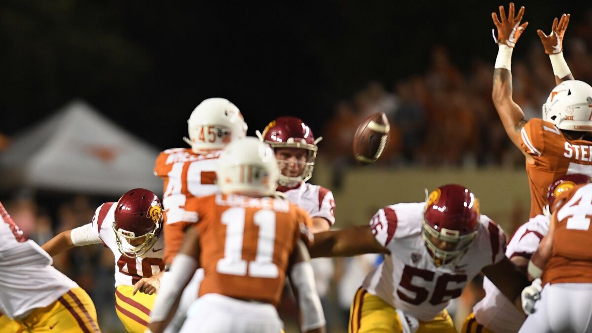 USC placekicker Chase McGrath has his field goal blocked by Texas in the third quarter at Royal-Texas Memorial Stadium on Saturday.