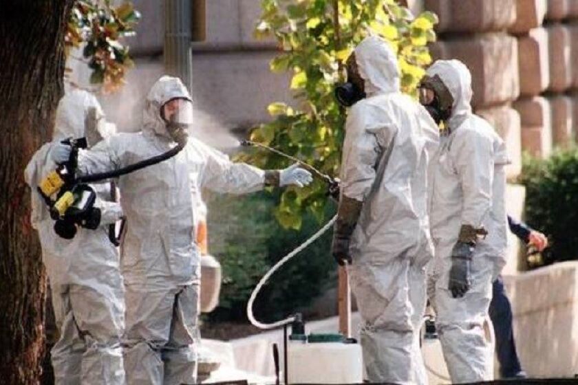 A hazardous materials worker is hosed down on Capitol Hill in October 2001. The mailing of anthrax-laced letters that fall gave momentum to the idea that the military needed defenses against biological threats.