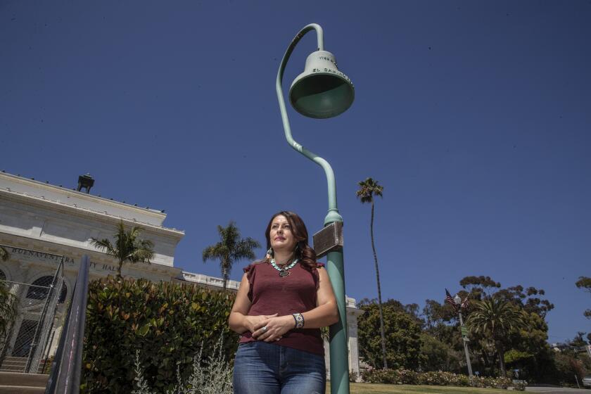 Veronica Valadez, 46, stands near where a statue of Father Junípero Serra once stood in front of Ventura City Hall.