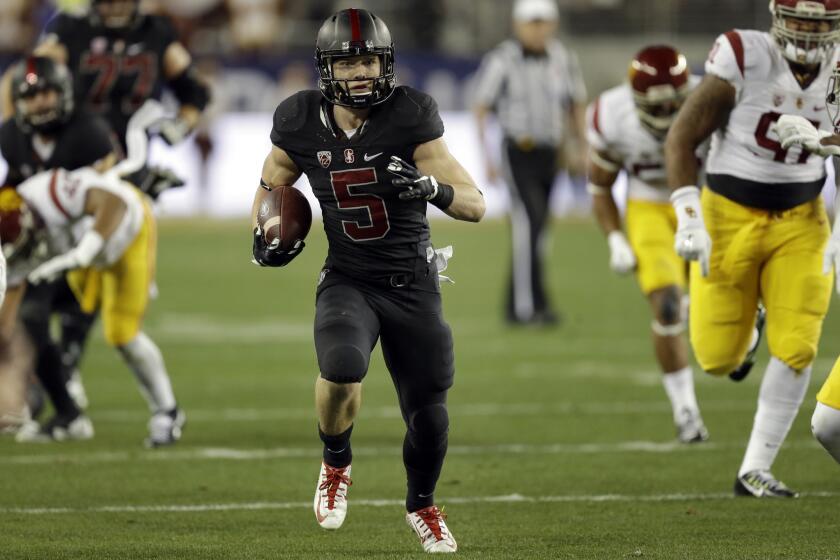 Stanford running back Christian McCaffrey (5) rushes against USC in the Pac-12 Conference championship.