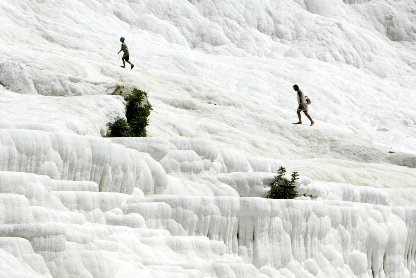 Popular since ancient times, the Pamukkale hot springs are one of Turkey's top attractions. The name itself means "Cotton Castle," which describes the fluffy-looking mineral deposits. More photos...