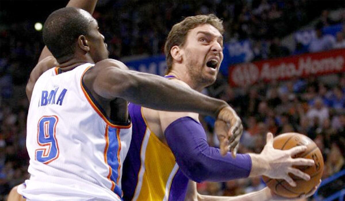 Pau Gasol looks to score against the Thunder's Serge Ibaka during a game this month in Oklahoma City.