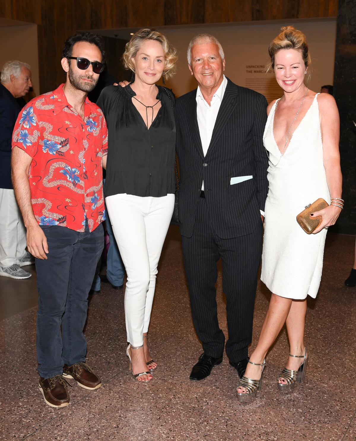 Artist Alex Israel, Sharon Stone and art dealers Larry Gagosian and Chrissie Erpf. (Billy Farrell / BFA.com)