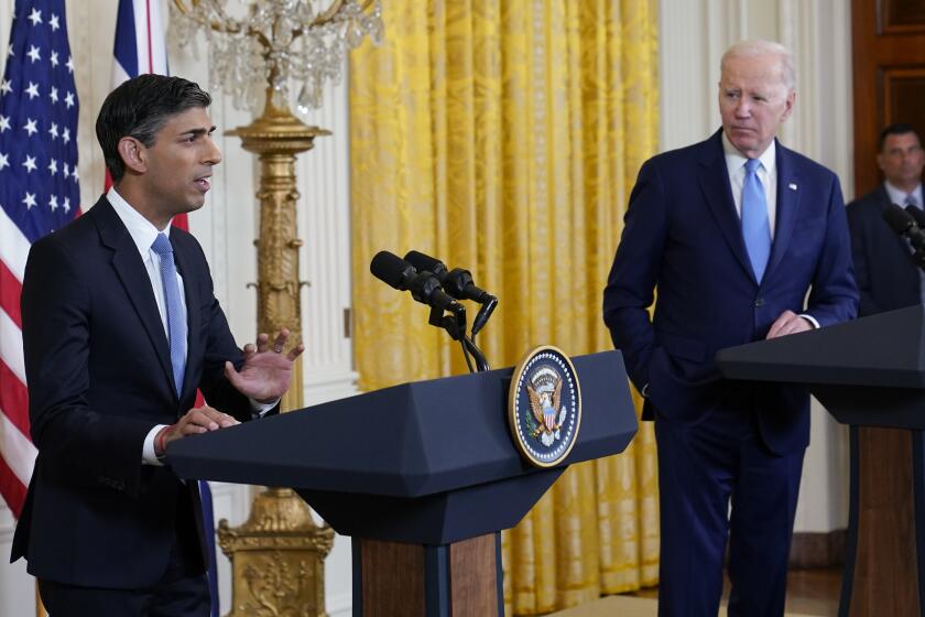 President Joe Biden listens as British Prime Minister Rishi Sunak during a news conference in the East Room of the White House in Washington, Thursday, June 8, 2023. (AP Photo/Susan Walsh)