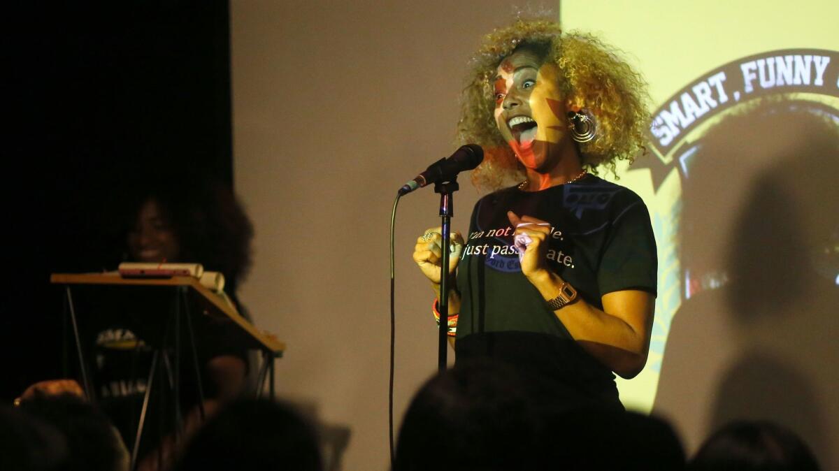 Amanda Seales hosting a comedy game show at the Nerdist Showroom on July 10, 2017. (Christian K. Lee / Los Angeles Times)