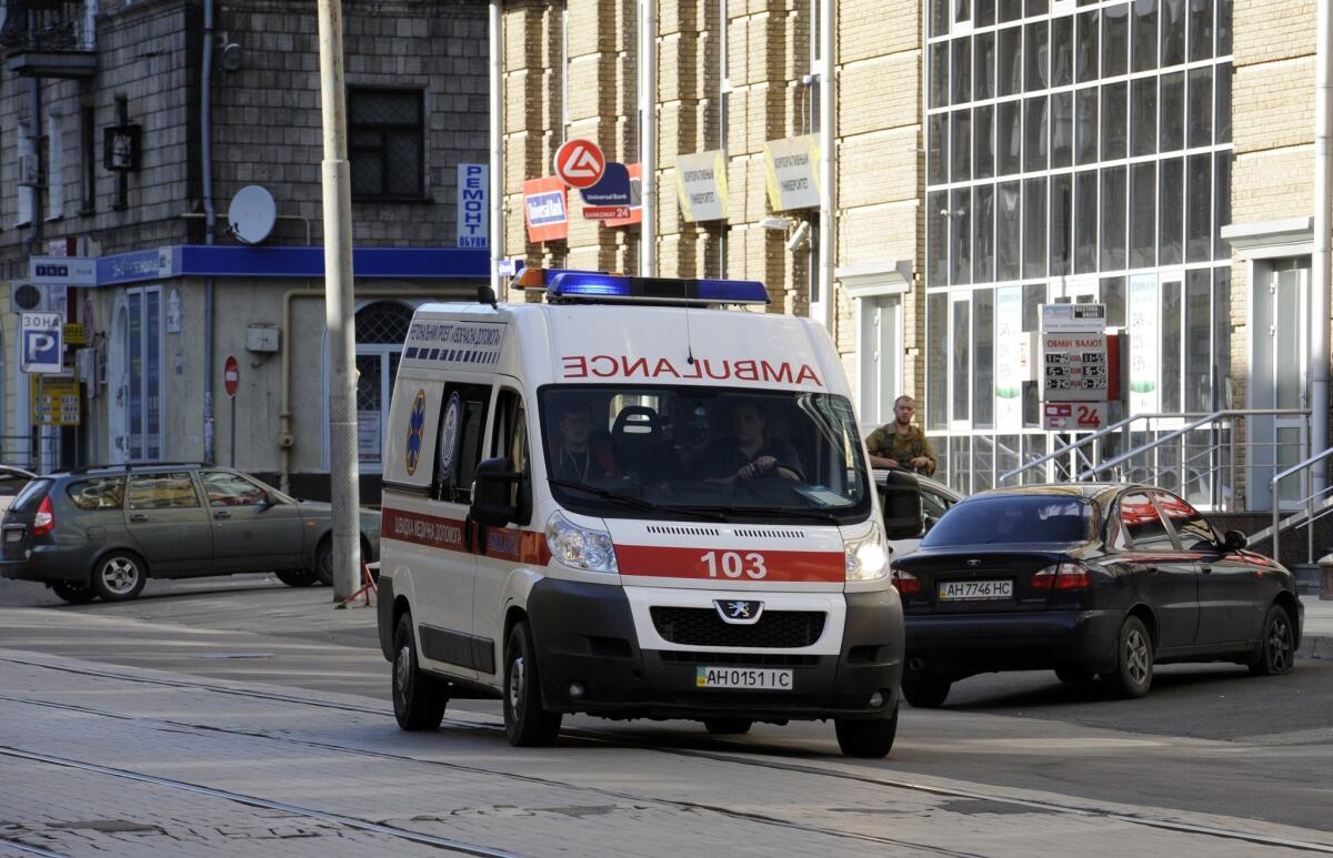 Human Rights Watch says easter Ukraine's pro-Russia separatists have been using ambulances, like this one seen taking a patient to a hospital in Donetsk, to ferry gunmen to and from battle zones, in violation of the laws of war.