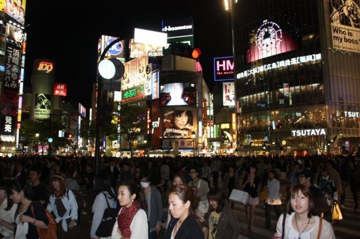 A bustling shopping area in Tokyo, ranked as the most expensive city for expats