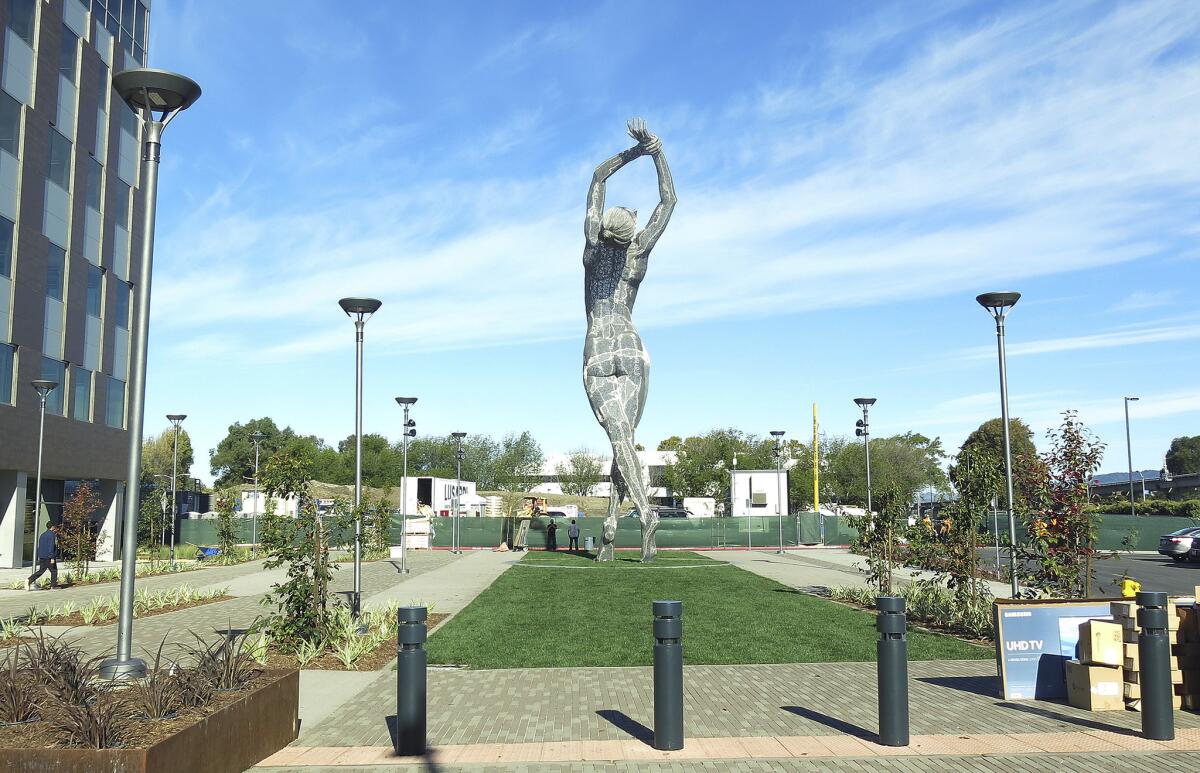 A 55-foot nude statue stands in San Leandro.