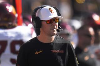 Southern California head coach Lincoln Riley watches against Michigan in the first half.