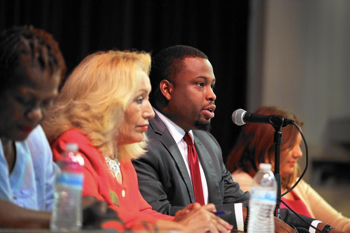 Lynwood school board candidate Gary Hardie addresses the audience at the student-organized debate Wednesday.