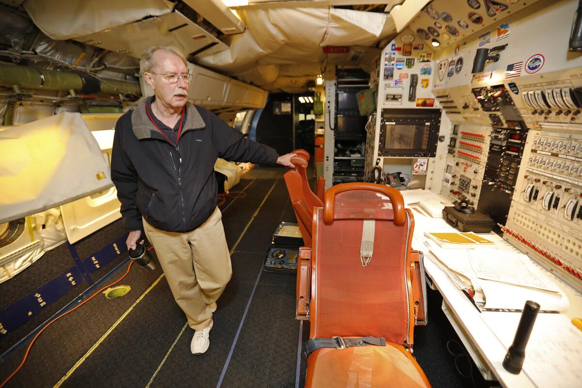Chris Jennison, a DC-8 mission manager, aboard the NASA-operated plane in Palmdale.