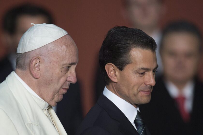 Pope Francis with Mexican President Enrique Pena Nieto during a welcome ceremony at National Palace in Mexico City